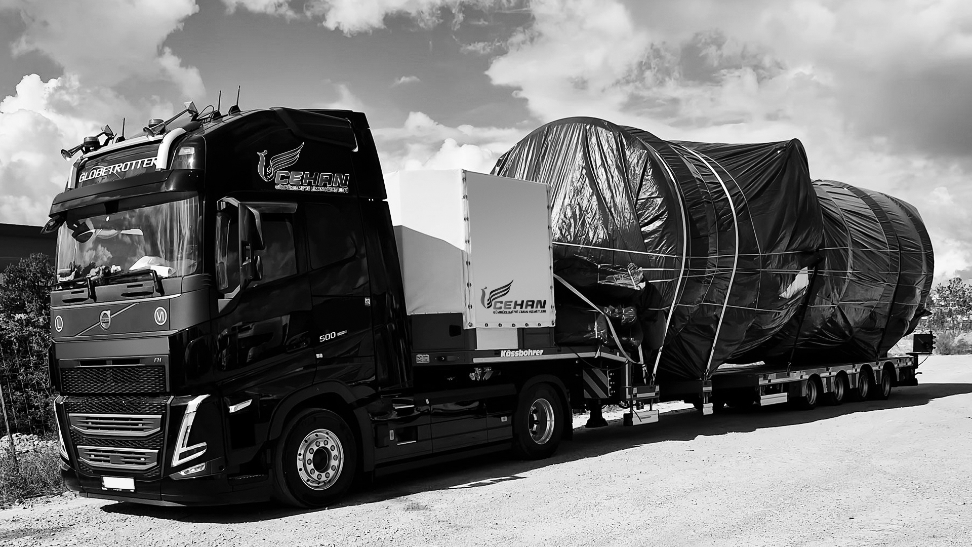 Aerial view of container cargo ship in sea.